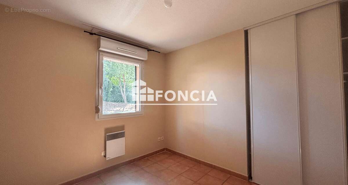 Béziers – Rez-de-jardin T3 de 54m² avec jardin privatif de 70m² et parking en résidence sécurisée - photo 9