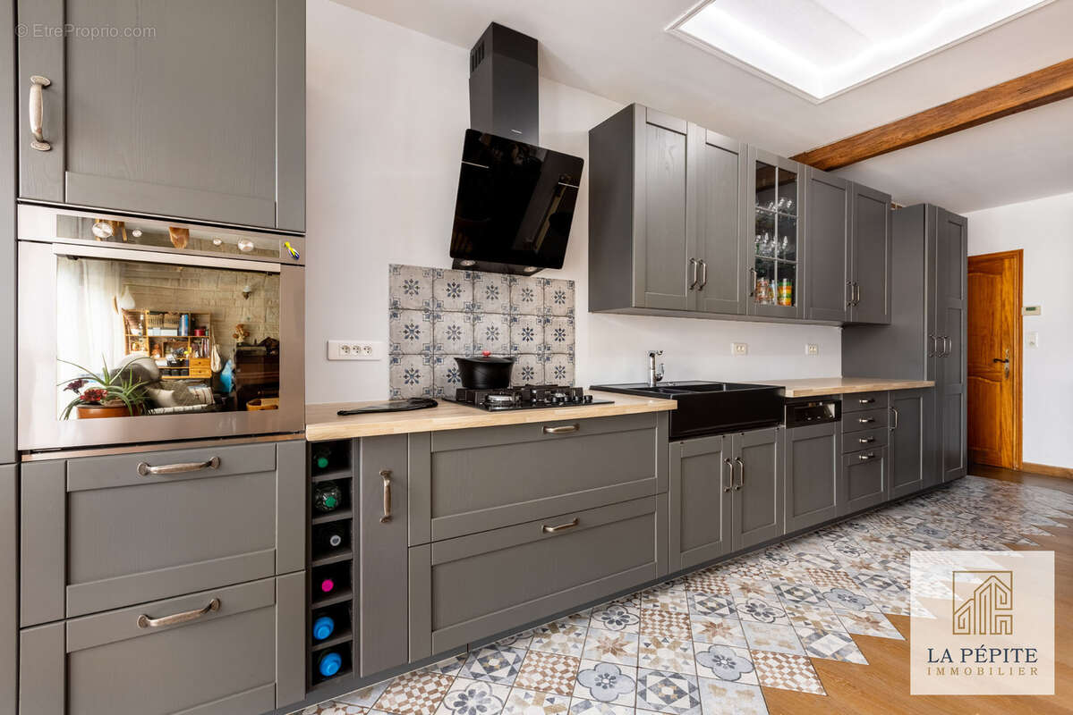 Maison à QUIEVRECHAIN