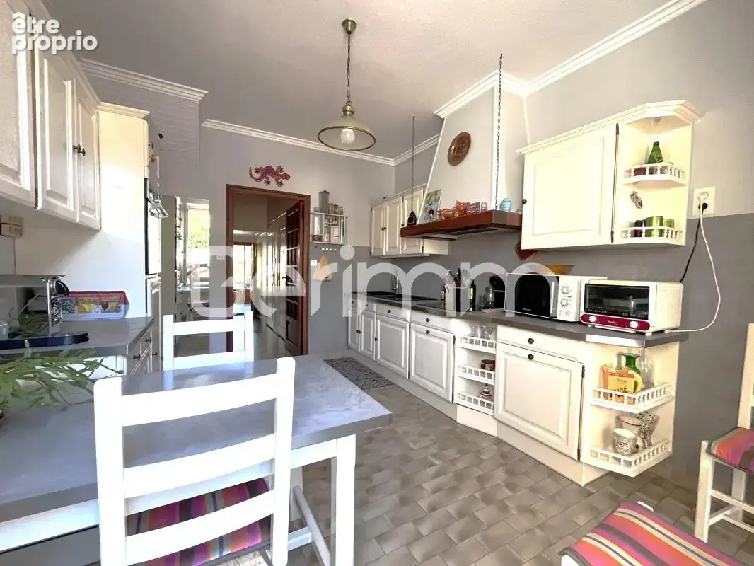 Vente - Maison - 4 pièces + cuisine - 100 m² - 319 000 € - - photo 5