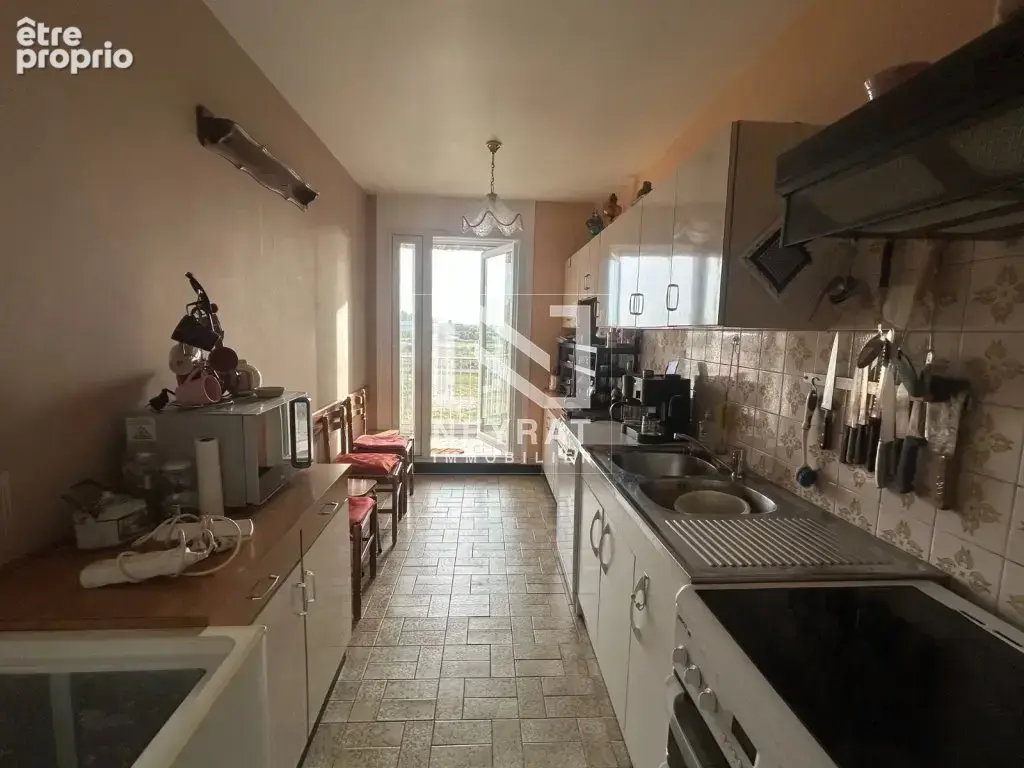 Appartement 4 pièces 80 m² à vendre à Digoin (71160) - photo 5