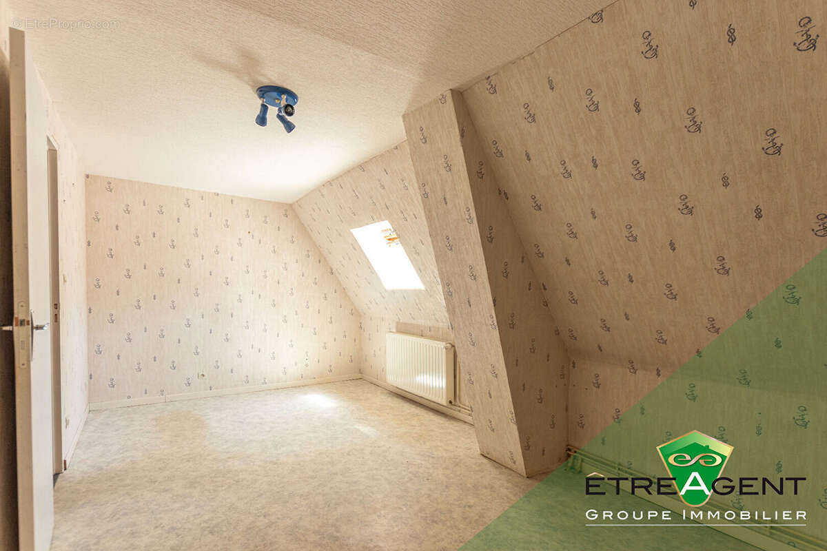 Maison DAMVILLE CENTRE-VILLE - 142 m² - 3 chambres - photo 12