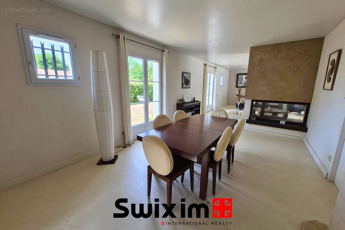 Propriété de 7 piéces avec un appartement de type T3. - photo 2