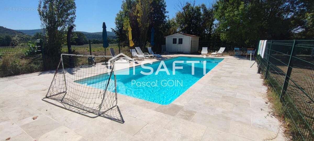 Photo 3 - Maison à SAINT-JEAN-DE-MARUEJOLS-ET-AVEJAN