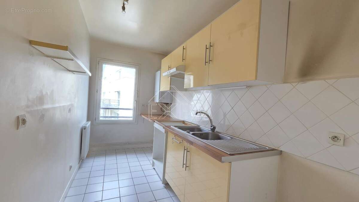 Appartement de type f3 en centre ville de mantes la jolie avec place de parking et balcon - photo 7