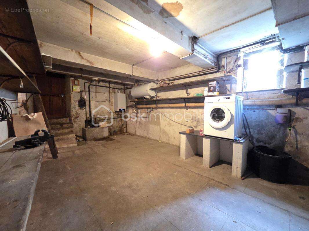 Magnifique appartement T3 de 101m² avec place de parking privative et cave en hypercentre ville de Nevers - photo 26