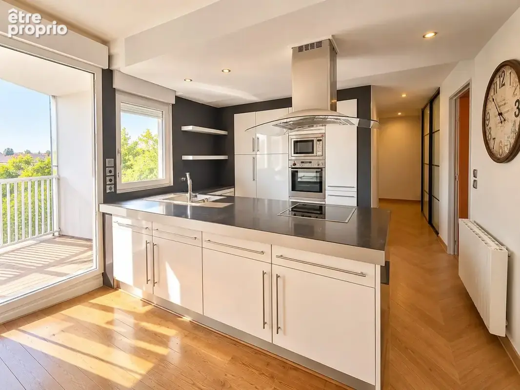 Appartement 4 pièces 87 m² à vendre à Lens (62300) - photo 2