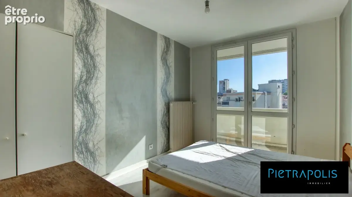 Appartement 5 pièces 77 m² à vendre à Saint-Etienne (42000) - photo 4