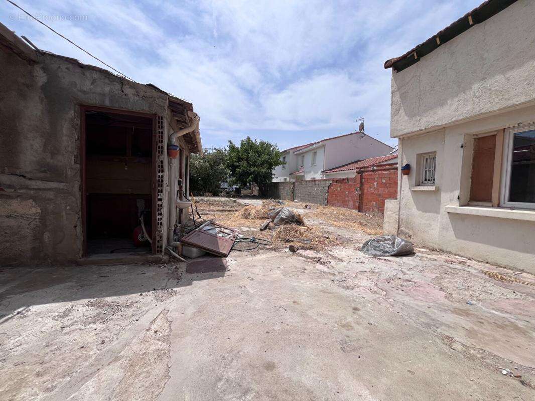 Maison de plain-pied de 95 m² environs avec travaux à prévoir sur un terrain de 509 m² proche de l'aéroport - photo 5