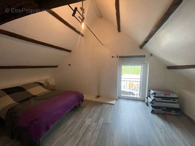 Maison à REGUINY