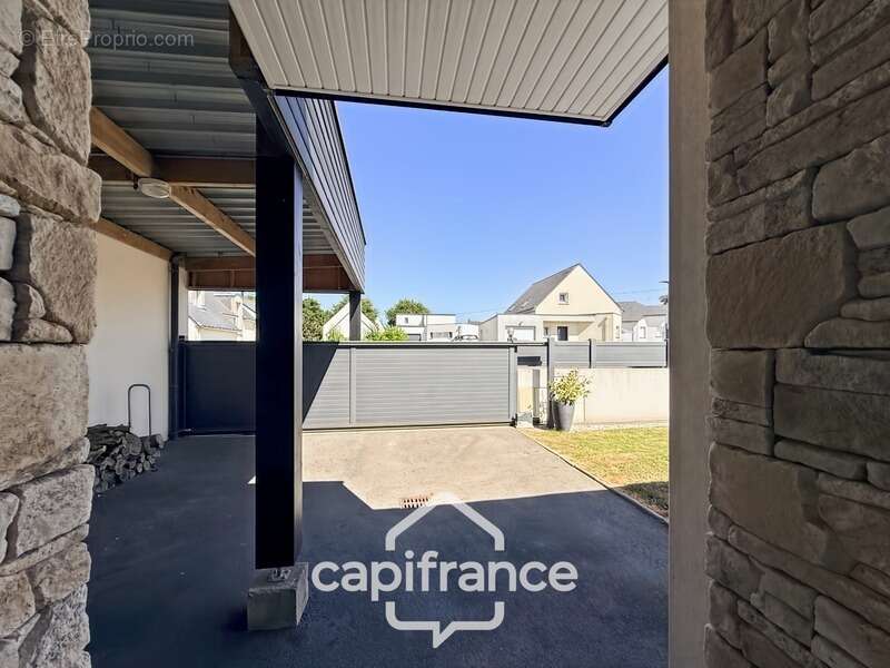 Maison contemporaine de plain-pied de 160 m² – 4 chambres – Véranda de 27 m² avec spa – Double garage – Carport – Noyal-Pontivy - photo 26