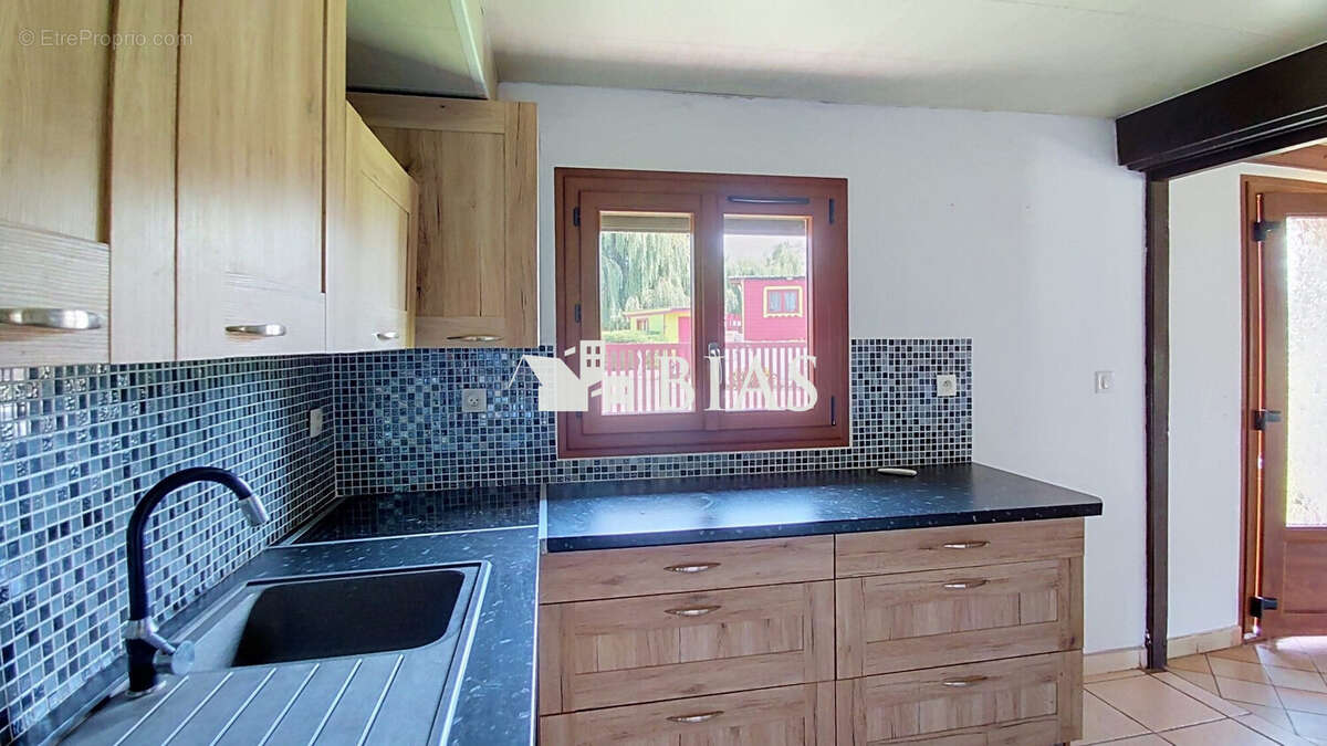 Maison 90 m² à Bourg-Achard  - photo 7