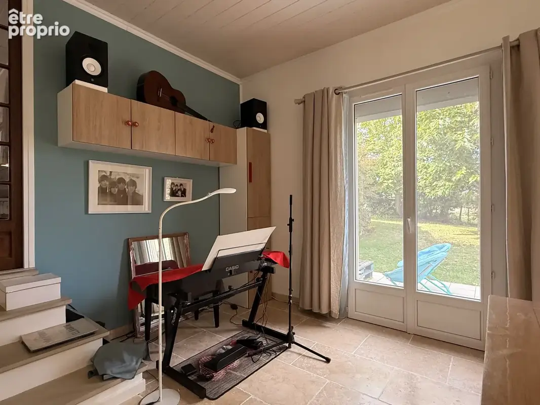 Maison familiale sur 1 hectare de terrain arboré - photo 7