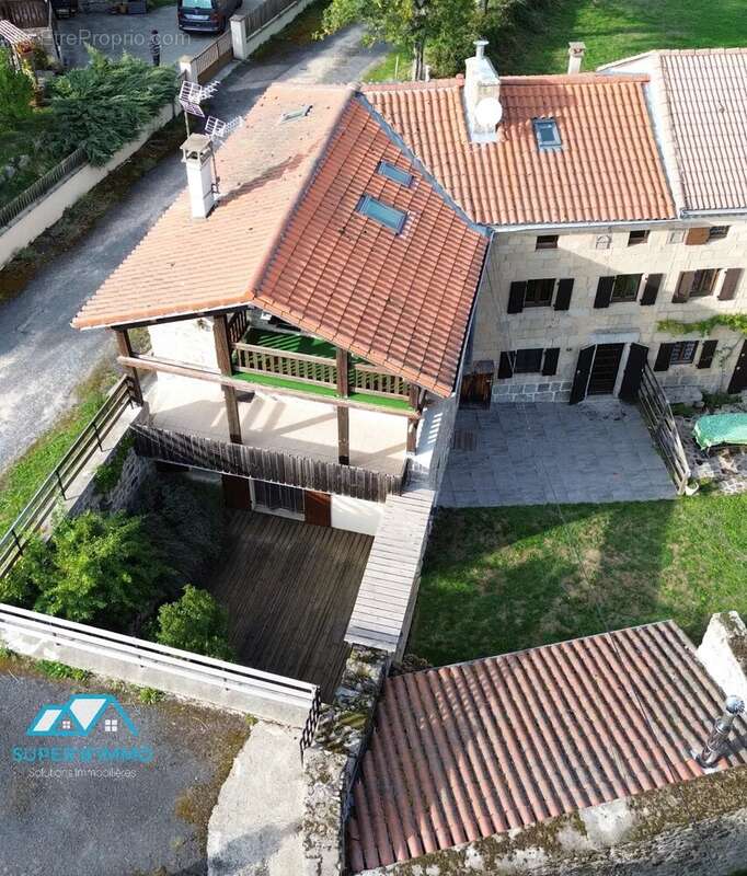 Batisse en pierre avec 2 logements et terrain - photo 17