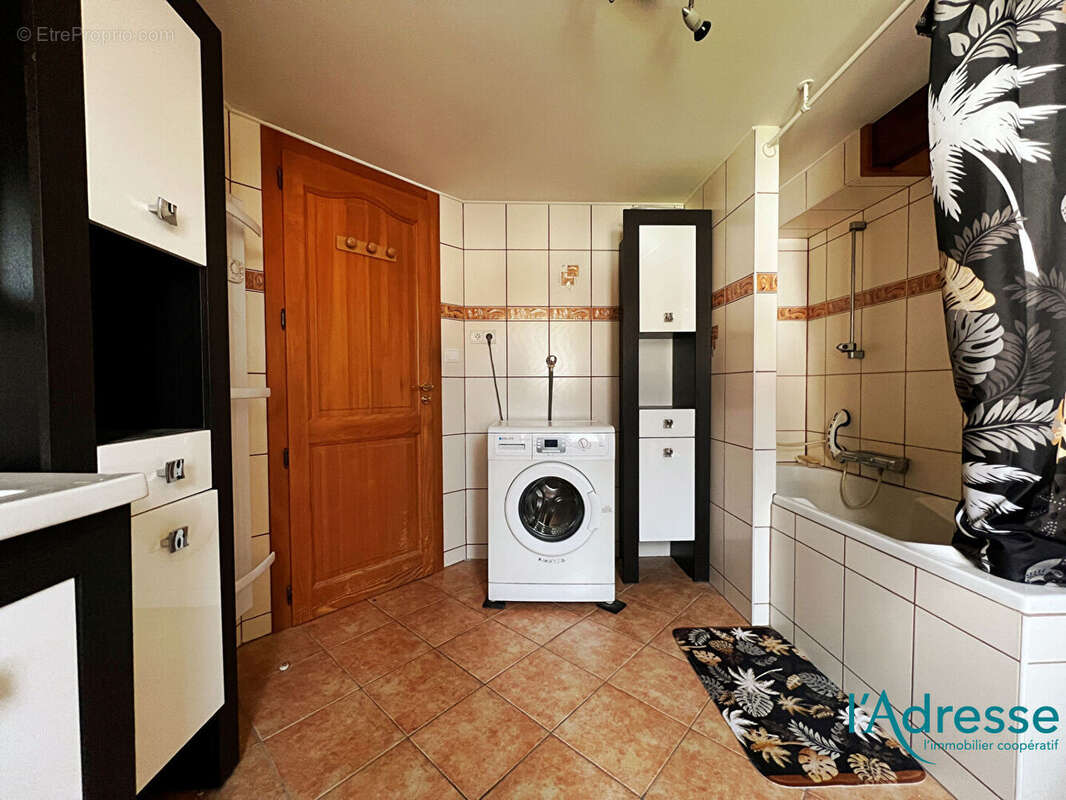 Appartement  en duplex F4 - avec stationnements et jardin - photo 12