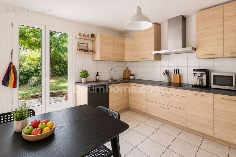 Maison familiale atypique de 170 m² avec jardin, terrasse et garage double – Collonges-au-Mont-d'Or - photo 6
