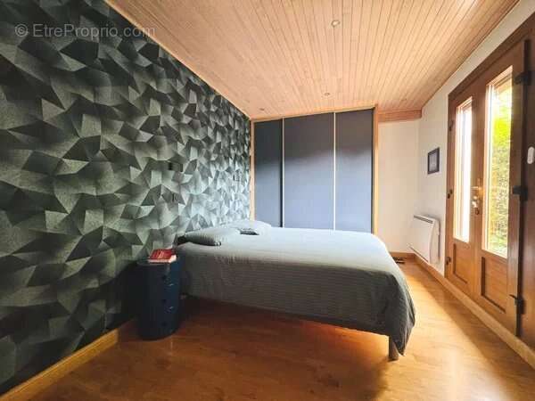 Appartement en rez-de-jardin avec garage et cave - photo 13