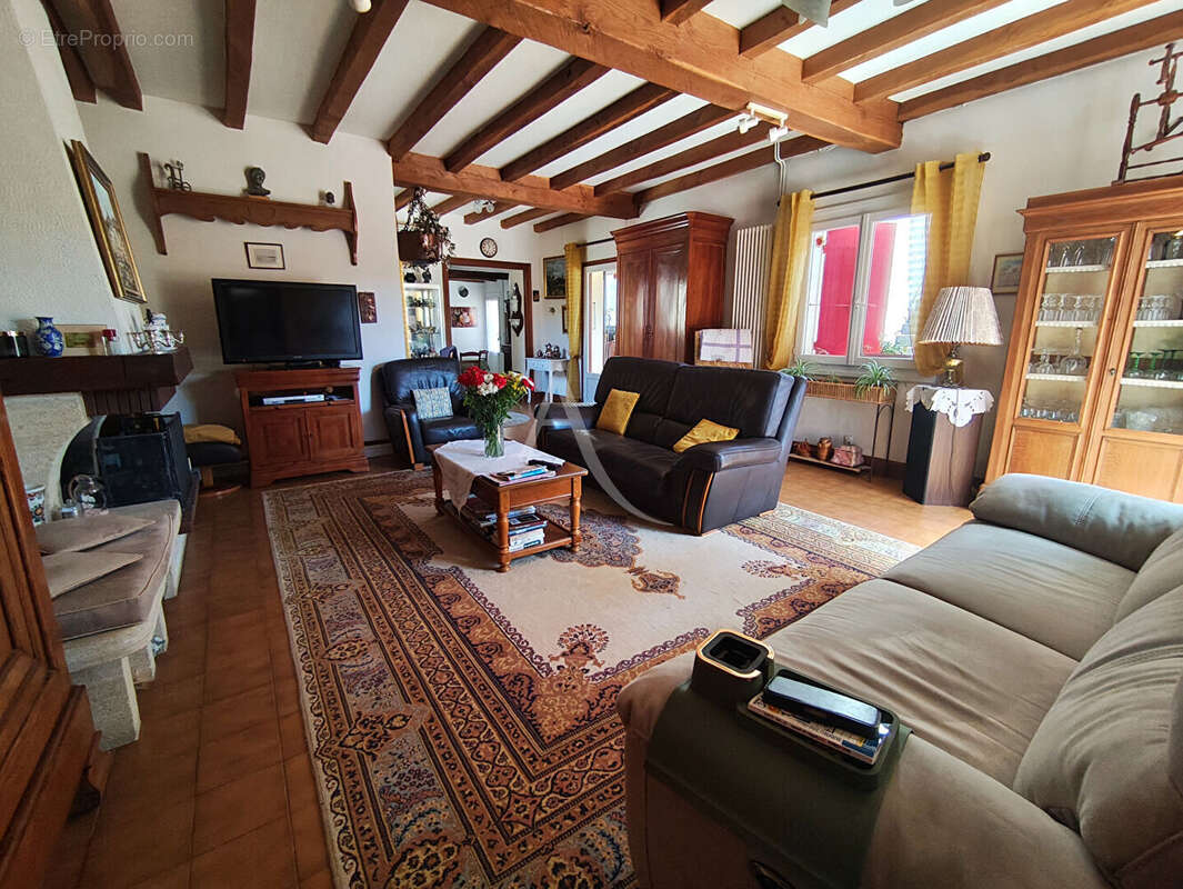 Maison à SOULIGNONNE