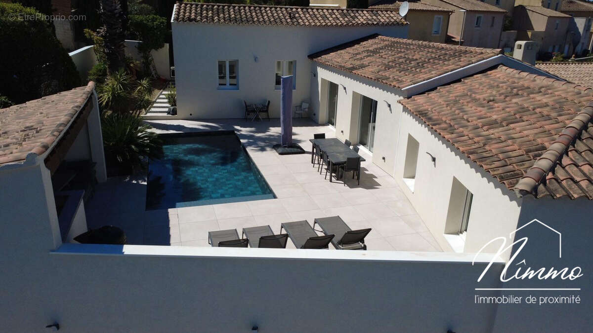 Nimes vacquerolles villa contemporaine de plain pied 140 m2 avec piscine pool house jardin de 593 m2 garages - photo 3