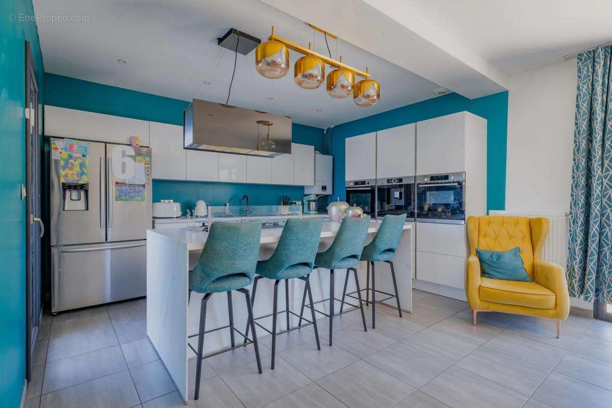 Maison de 6 pièces de 128 m² à Charvieu-Chavagneux - photo 4