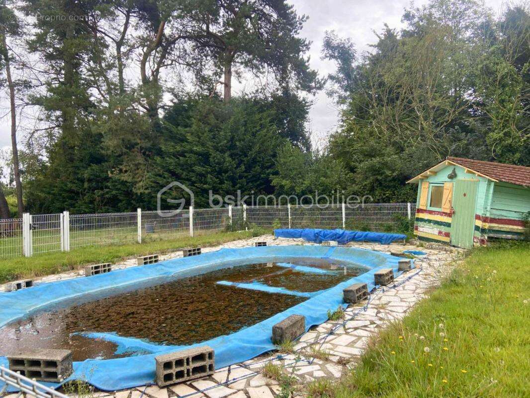 Maison de plain – pied à fort potentiel – Terrain 5000 m² – Dépendance – Grange – Garages – Cave – Piscine – Environnement calme - photo 20