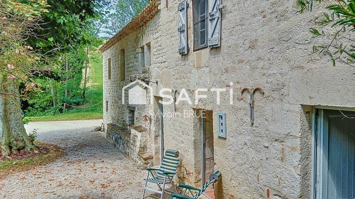 Photo 1 - Maison à CASTELNAU-MONTRATIER