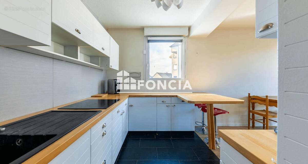 Exclusivite foncia -tres beau trois pieces entierement renove - parking interieur - balcon - photo 5