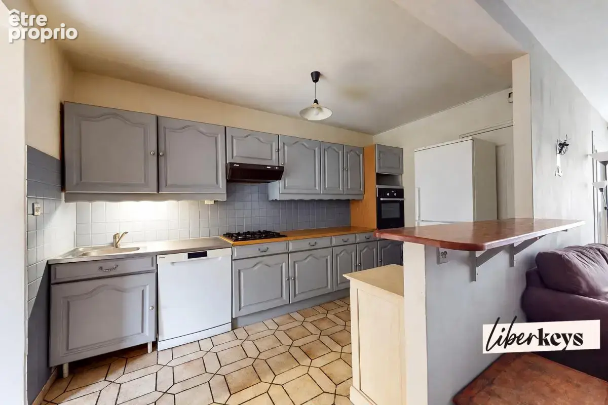 Maison de 120m² avec 4 chambres, jardin, garage, et cave - photo 4