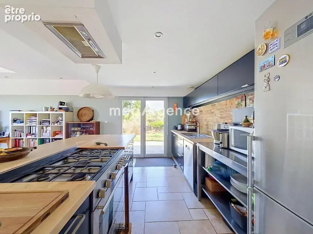 Maison de plain-pied – 148 m² – Grands volumes et vue sur le château - photo 5