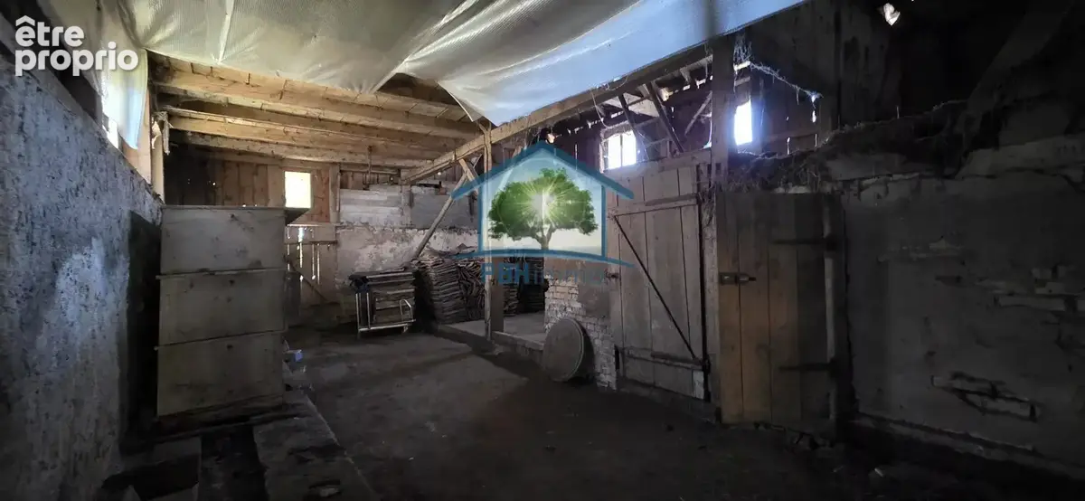 DANNEMARIE (68) - Maison mitoyenne de 7 pièces avec grande grange et terrain constructible - photo 2