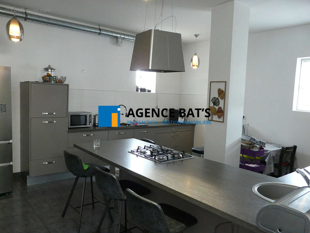 Photo 4 - Appartement à SAINT-GENEST-LERPT
