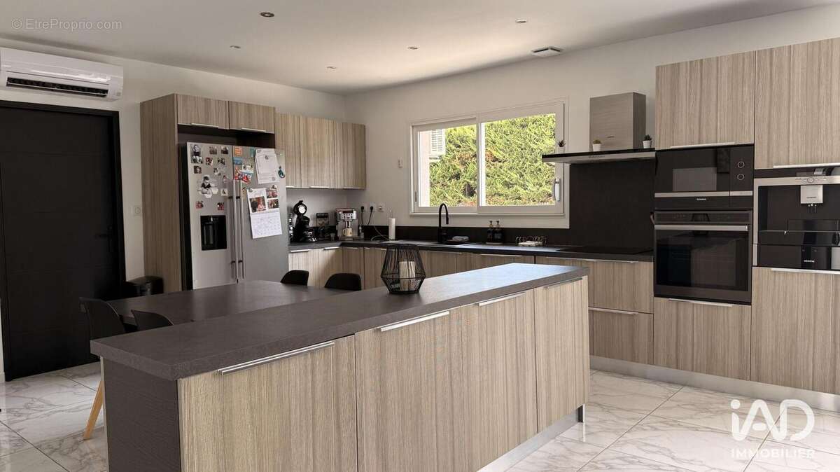Maison 140 m² à Riorges  - photo 2