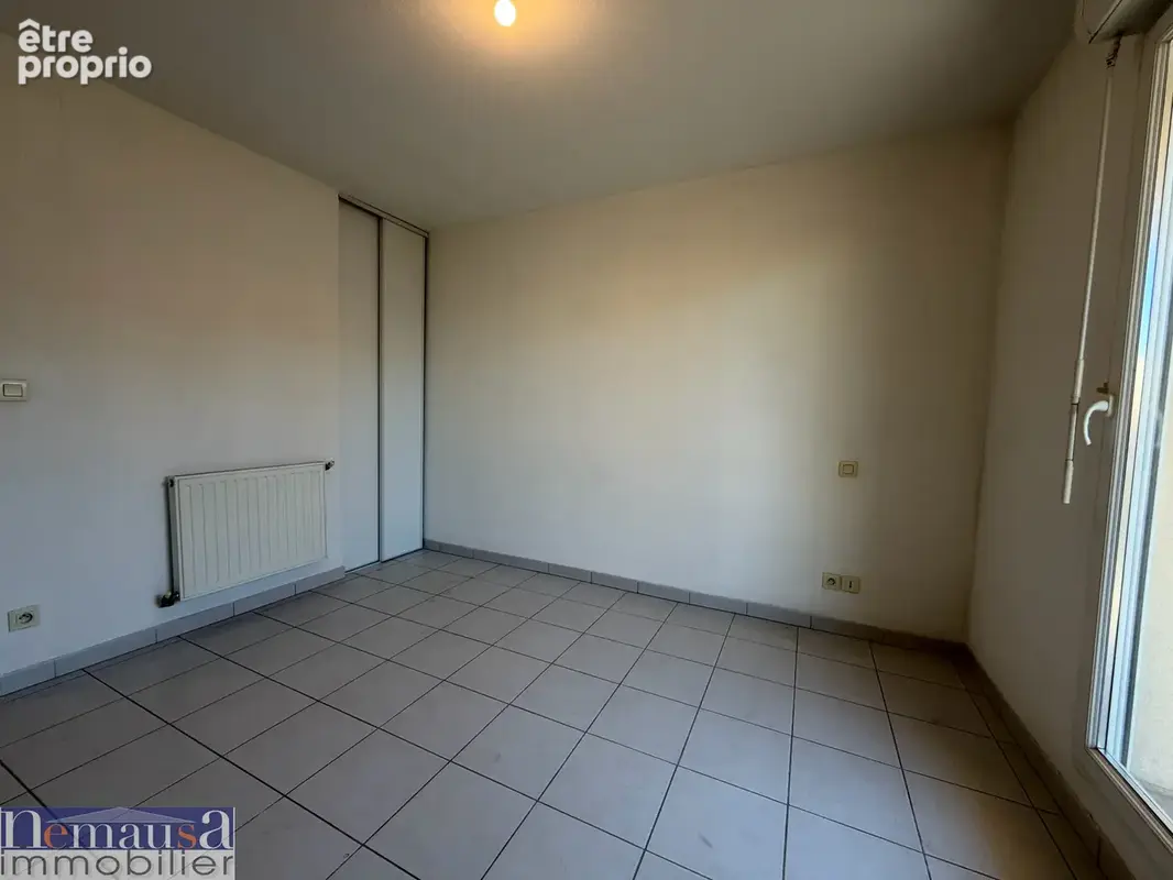 NIMES- Appartement T2 avec place de parking et balcon - photo 6