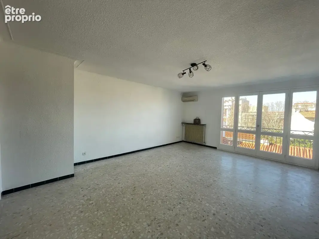 Vente appartement T4 avec balcon, cave et place de parking sécurisée, 66000 Perpignan, quartier de la gare. - photo 9