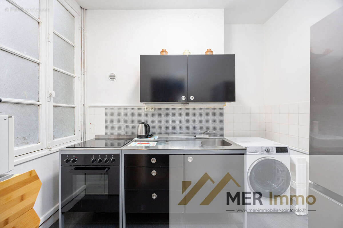 SAINT MALO INTRA-MUROS Appartement T4 de 75 m2 au 1 er étage d'une copropriété en bon état - photo 6