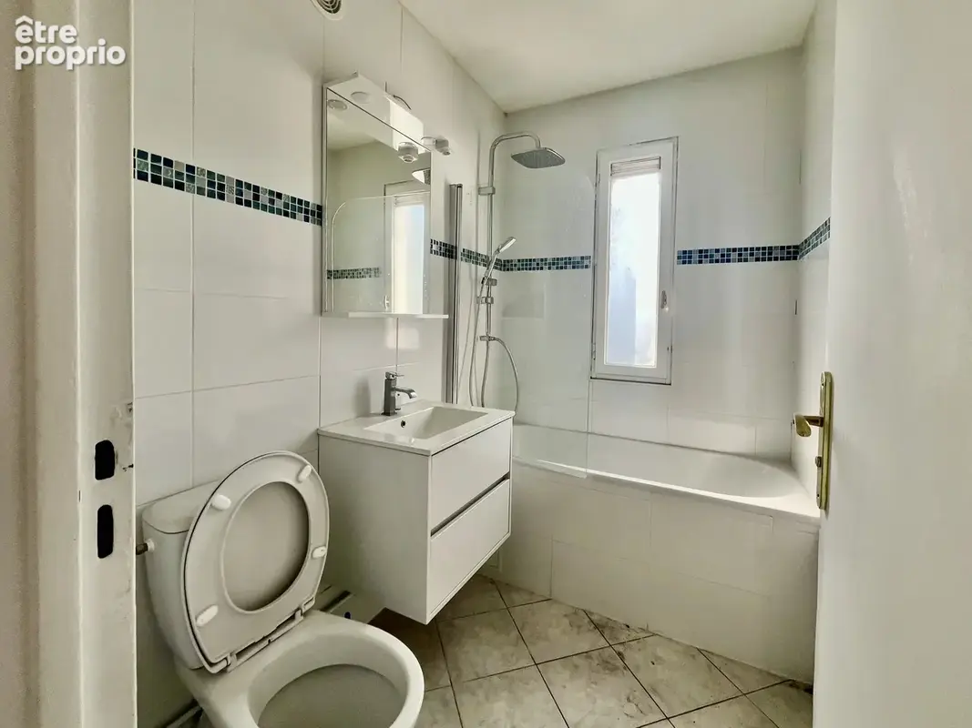 Coup de cur familial : Grand F5 de 103 m² avec balcon et vue sur Paris  Le Blanc-Mesnil - photo 4