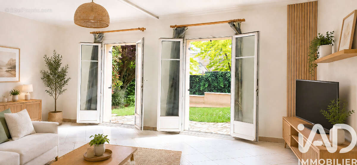 Photo 2 - Maison à VAUREAL