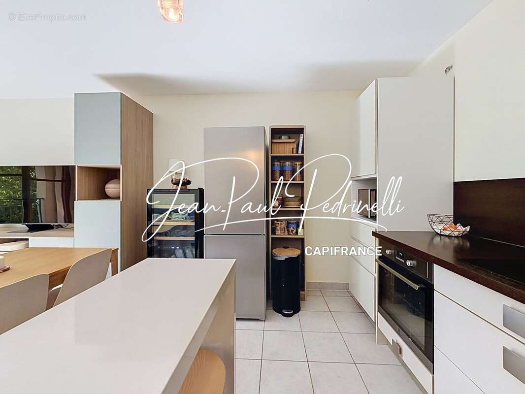Tassin-la-Demi-Lune - Appartement 2 pièces de 48 m² avec balcon, parking privatif et cave - résidence sécurisée récente - photo 13