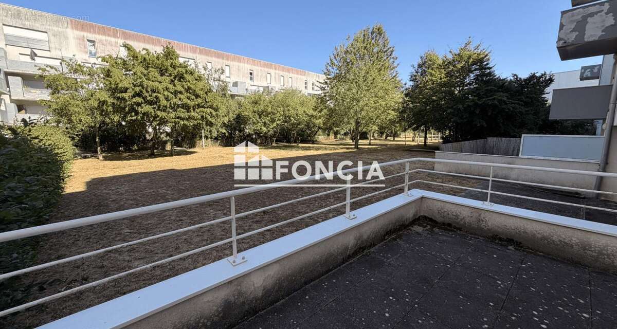 Type 4 avec balcon -  residence récente avec stationnement - photo 2