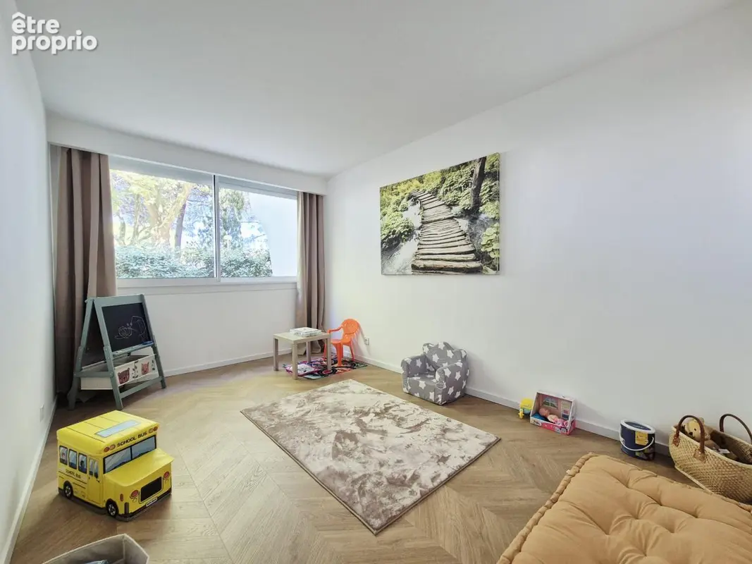 Grand T4 secteur ponant en rez-de-jardin. - photo 6