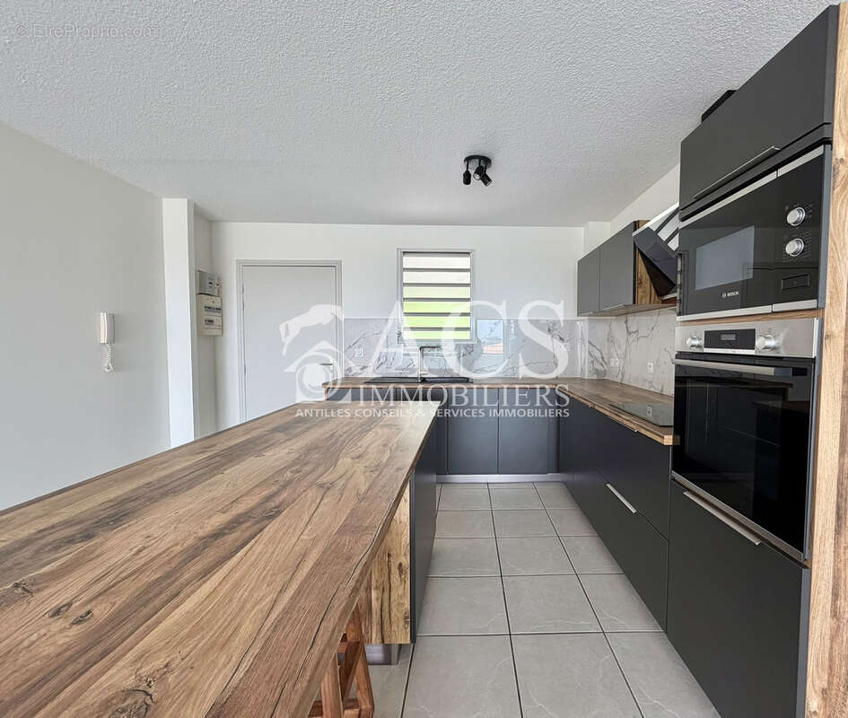 Appartement de type F3 -  Vue dégagée - Morne Pavillon - LE LAMENTIN - photo 6