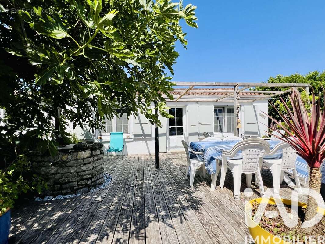 Maison 98 m² à Saint-Xandre  - photo 4