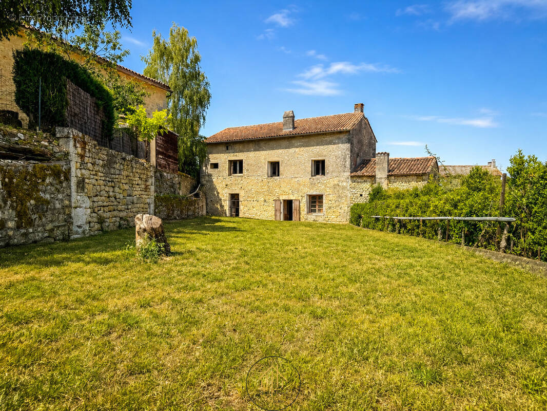 Maison à TOUVRE