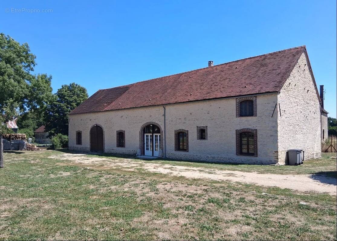 Maison à RACINES