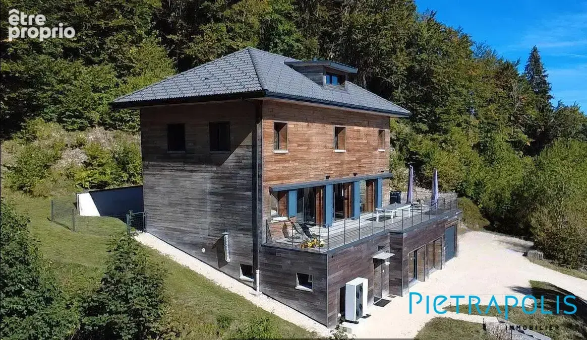 Maison 7 pièces 230 m² à vendre à Mijoux (01170) - photo 5