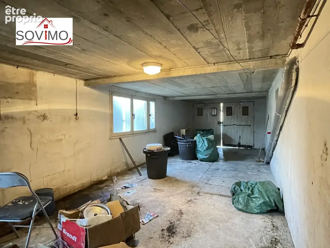 Maison de ville à rénover : jardin, garage et beau potentiel - photo 30