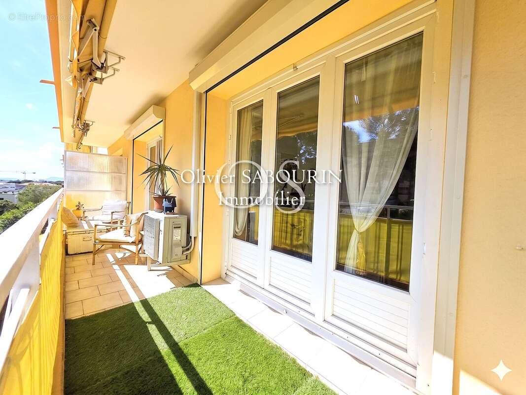 Appartement - 74m² - 2 chambres - Terrasse - photo 3