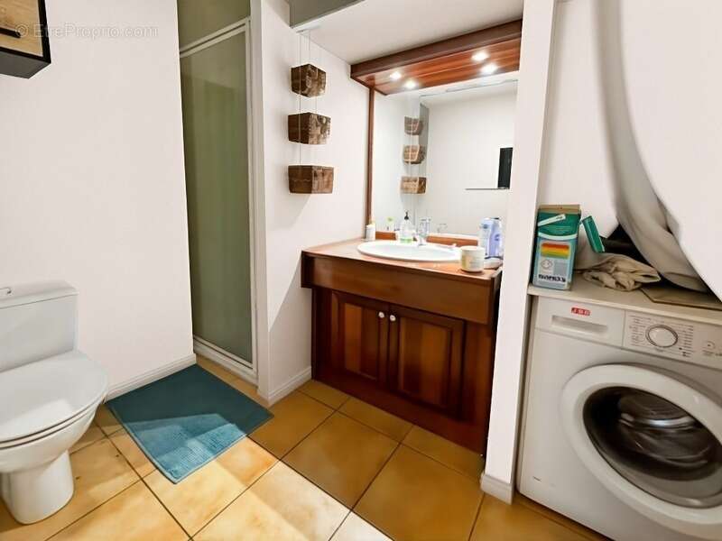 Investissement locatif – Studio vendu loué Résidence Terrasses de Moulin Joli la Possession - photo 3