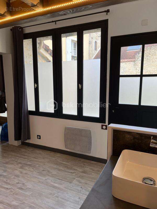 Appartement T2 de 73m² + Box - photo 3