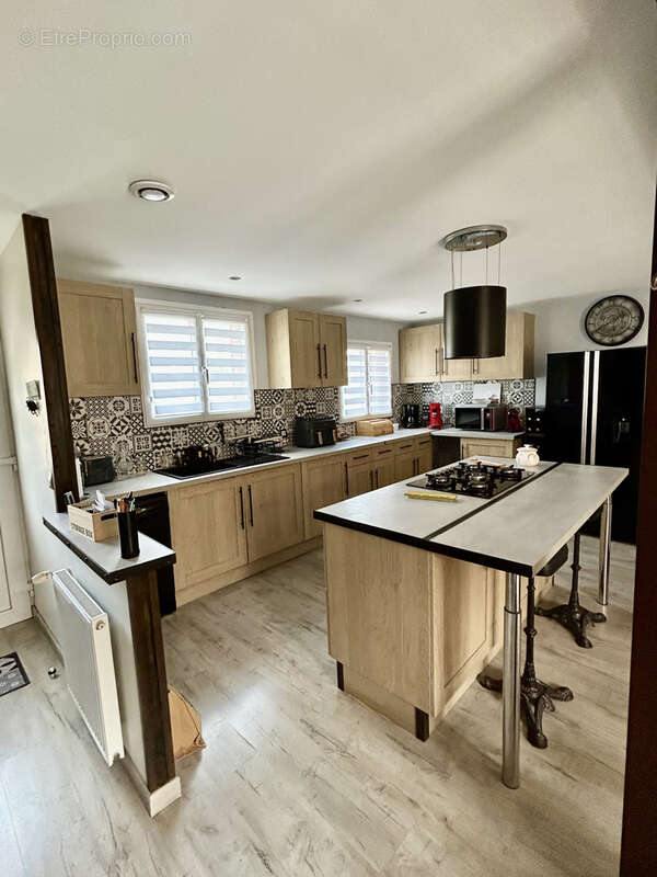 A VENDRE maison individuelle avec jardin - photo 2