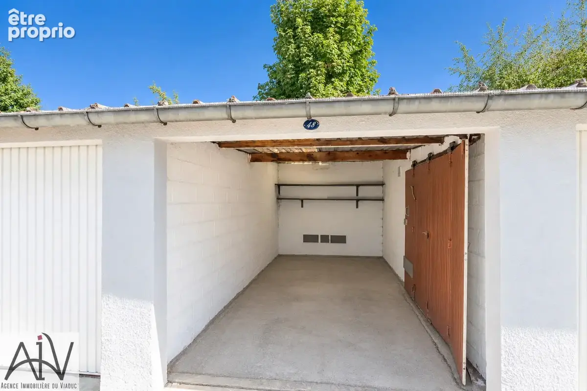 Appartement 5 pièces de 82 m2 avec trois chambres, box et cave - photo 12